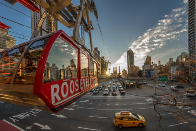 Roosevelt Island Tram departing at sunrise.